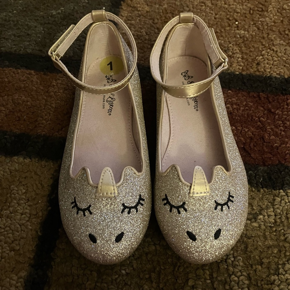 slightly worn size 1 dress shoes.